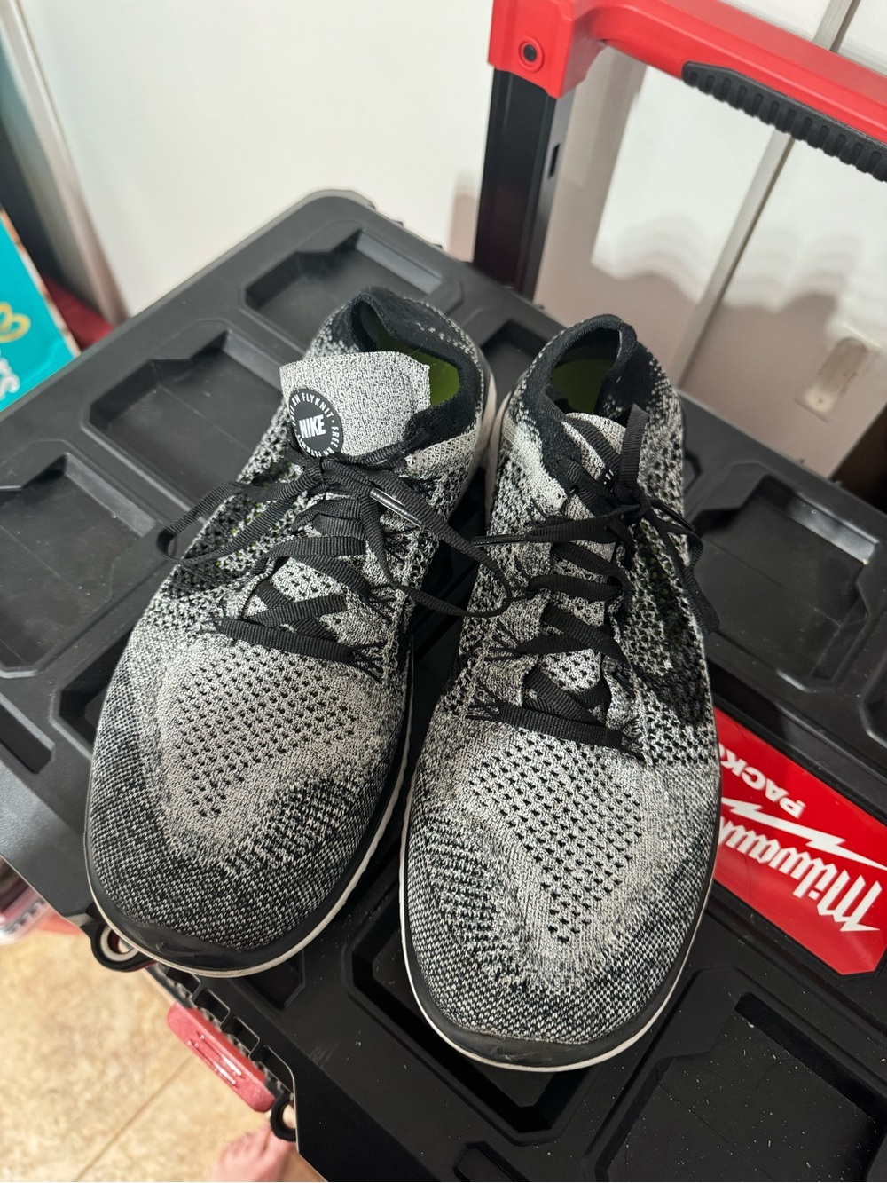 Nike Black and Neon Green Flyknit Running Sneakers
